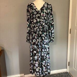 Loft floral long sleeve dress with small flirty slit.